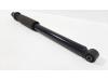 Rear shock absorber, left from a Nissan Note (E12) 1.2 68 2017