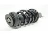 Fronts shock absorber, left from a Opel Zafira Tourer (P12) 1.6 CDTI 16V 136 2019