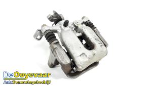 Used Rear brake calliper, left Opel Astra K Sports Tourer 1.0 Turbo 12V Price € 49,99 Margin scheme offered by Autodemontagebedrijf De Ooyevaar