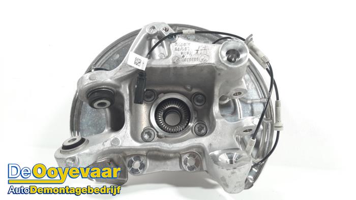 Knuckle, front left from a BMW 5 serie (G30) 523i 2.0 TwinPower Turbo 16V 2021