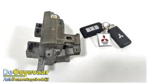Used Ignition lock + key Mitsubishi Space Star (A0) 1.2 12V Price € 99,99 Margin scheme offered by Autodemontagebedrijf De Ooyevaar