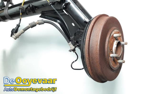 Rear-wheel drive axle from a Ford B-Max (JK8) 1.0 EcoBoost 12V 125 Van 2014