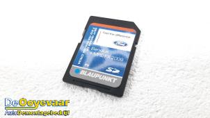 Used SD navigation card Ford Focus 2 1.8 16V Price € 49,99 Margin scheme offered by Autodemontagebedrijf De Ooyevaar