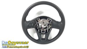 Usagé Volant Mazda 2 (DJ/DL) 1.5 SkyActiv-G 75 Prix € 65,00 Règlement à la marge proposé par Autodemontagebedrijf De Ooyevaar