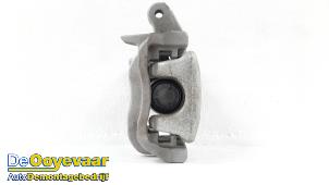 Used Rear brake calliper, left Nissan Qashqai (J11) 1.3 DIG-T 140 16V Price € 99,99 Margin scheme offered by Autodemontagebedrijf De Ooyevaar