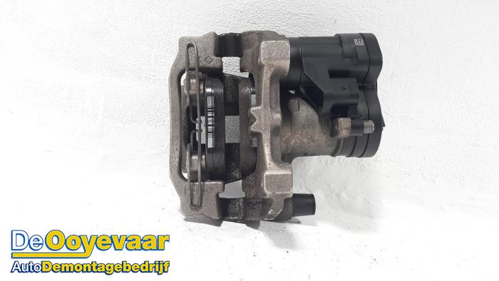 Rear brake calliper, left from a Volkswagen Caddy Cargo V (SBA/SBH) 2.0 TDI BlueMotionTechnology 2021