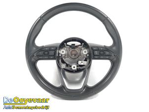 Used Steering wheel Toyota Yaris IV (P21/PA1/PH1) 1.5 12V Hybrid Price € 124,99 Margin scheme offered by Autodemontagebedrijf De Ooyevaar