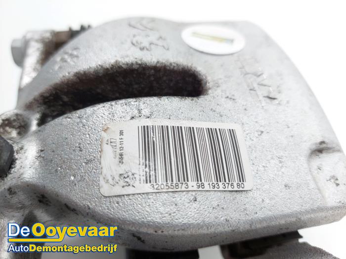 Zacisk hamulcowy lewy tyl z Opel Combo Cargo 1.5 CDTI 100 2019