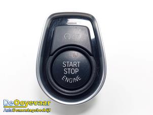 Used Start/stop switch BMW 1 serie (F21) 116i 1.6 16V Price € 14,99 Margin scheme offered by Autodemontagebedrijf De Ooyevaar