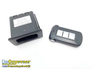 Used Ignition lock + key Mitsubishi Outlander (GF/GG) 2.0 16V PHEV 4x4 Price € 94,99 Margin scheme offered by Autodemontagebedrijf De Ooyevaar
