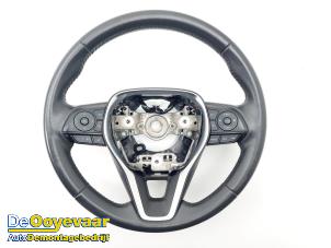 Used Steering wheel Toyota Corolla Touring Sport (E21/EH1) 1.8 16V Hybrid Price € 259,99 Margin scheme offered by Autodemontagebedrijf De Ooyevaar