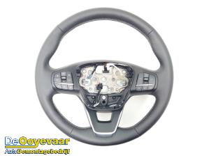 Used Steering wheel Ford Puma 1.0 Ti-VCT EcoBoost 12V Price € 100,00 Margin scheme offered by Autodemontagebedrijf De Ooyevaar