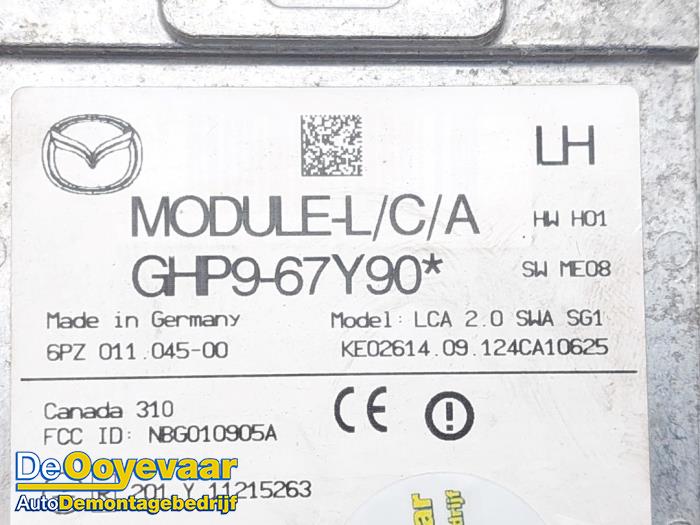 Dödvinkelsensor från en Mazda 6 SportBreak (GJ/GH/GL) 2.0 SkyActiv-G 165 16V 2013