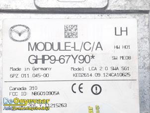 Dödvinkelsensor från en Mazda 6 SportBreak (GJ/GH/GL) 2.0 SkyActiv-G 165 16V 2013