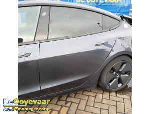Usagé Porte arrière gauche Tesla Model 3 EV AWD Prix € 899,99 Règlement à la marge proposé par Autodemontagebedrijf De Ooyevaar