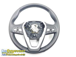 Used Steering wheel BMW 1 serie (F40) 118i 1.5 TwinPower 12V Price € 99,99 Margin scheme offered by Autodemontagebedrijf De Ooyevaar