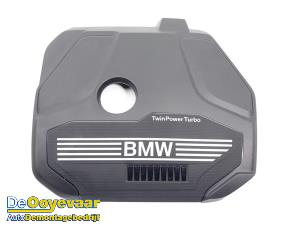 Usagé Couverture moteur BMW 1 serie (F40) 118i 1.5 TwinPower 12V Prix € 49,99 Règlement à la marge proposé par Autodemontagebedrijf De Ooyevaar