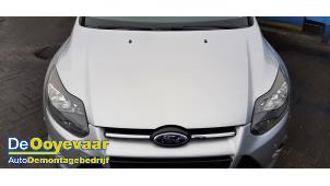Używane Maska Ford Focus 3 Wagon 1.6 SCTi 16V Cena € 199,99 Procedura marży oferowane przez Autodemontagebedrijf De Ooyevaar
