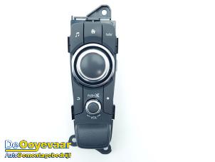 Used MMI switch Mazda 2 (DJ/DL) 1.5 SkyActiv-G 90 Price € 69,99 Margin scheme offered by Autodemontagebedrijf De Ooyevaar