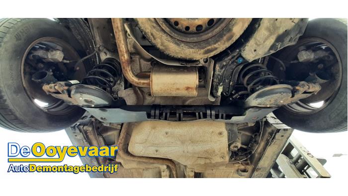 Rear axle beam with reducer