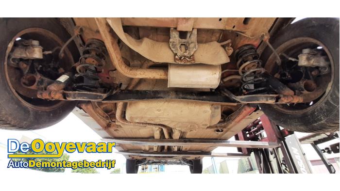 Rear axle beam with reducer