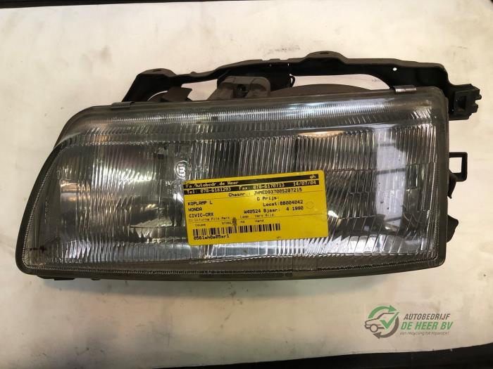 Używane Reflektor lewy Honda Civic CRX (ED/EE) 1.6i 16V Cena € 25,00 Procedura marży oferowane przez Autobedrijf de Heer B.V.