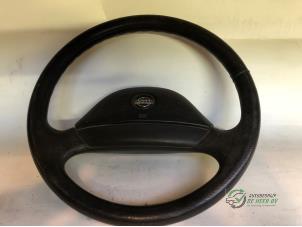 Used Steering wheel Nissan Primera Wagon (W10) 2.0i 16V SPi Kat. Price € 25,00 Margin scheme offered by Autobedrijf de Heer B.V.