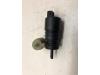 Windscreen washer pump from a Opel Astra G (F08/48) 2.2 16V 2003