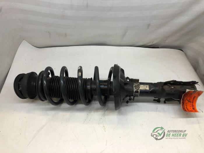 Front shock absorber rod, left from a Seat Ibiza 1997