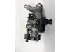 Injector housing from a Daihatsu Sirion/Storia (M1) 1.0 12V 1999