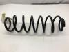 Rear coil spring from a Seat Ibiza III (6L1) 1.4 16V 75 Kat. 2003