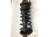 Front shock absorber rod, right from a Daihatsu Sirion/Storia (M1) 1.0 12V 1999