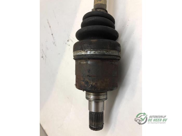 Front drive shaft, left from a Opel Agila (A) 1.2 16V 2000