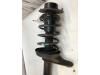 Front shock absorber rod, left from a Opel Astra F (53/54/58/59) 1.4i GL/GLS 1994