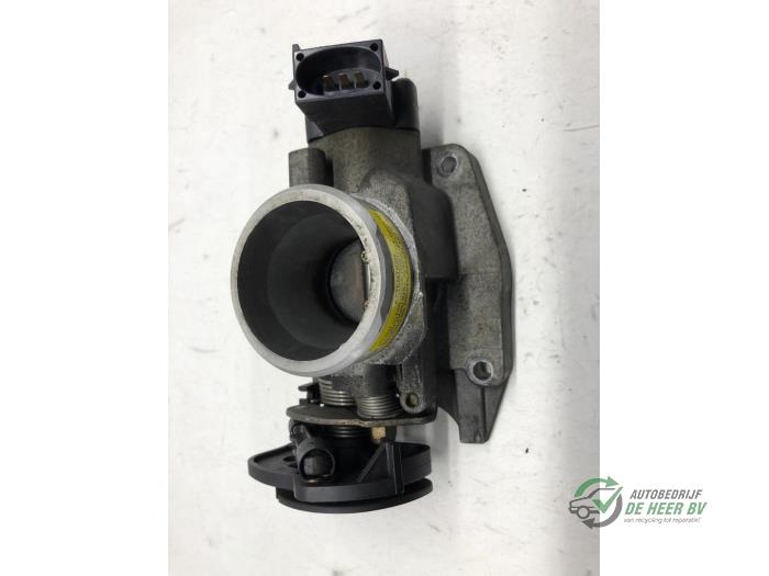 Injector housing from a Ford Fiesta 4 1.3i 1997