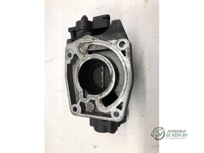 Injector housing from a Ford Fiesta 4 1.3i 1997