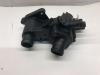 Thermostat housing from a Seat Ibiza II Facelift (6K1) 1.6 2000