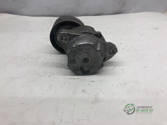 Drive belt tensioner from a Opel Vectra 1997