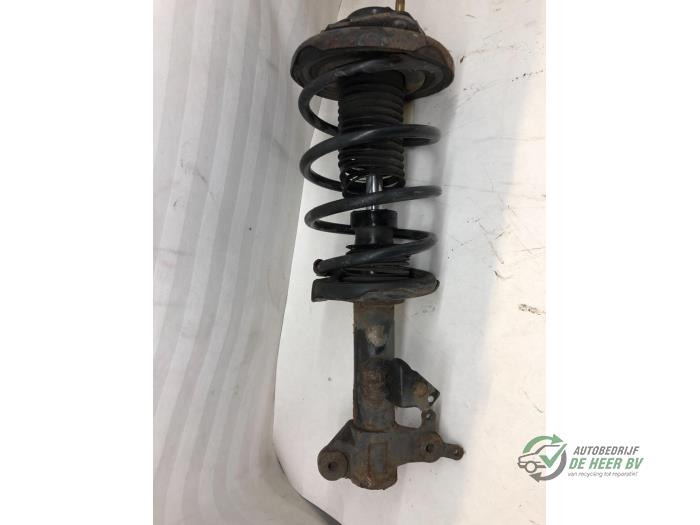 Front shock absorber rod, left from a Nissan Primera Wagon (W12) 2.2 dCi 16V 2002
