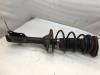 Front shock absorber rod, left from a Toyota Yaris (P1), 1999 / 2005 1.3 16V VVT-i, Hatchback, Petrol, 1.299cc, 63kW (86pk), FWD, 2NZFE; 2SZFE, 1999-08 / 2005-11, NCP10; NCP20; NCP22; SCP12 2001