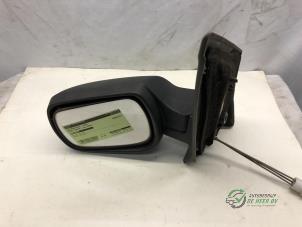 Usados Retrovisor externo izquierda Ford Fiesta 5 Precio € 25,00 Norma de margen ofrecido por Autobedrijf de Heer B.V.