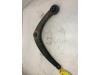 Front wishbone, left from a Peugeot 307 (3A/C/D) 1.6 16V 2004