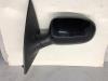 Wing mirror, left from a Opel Corsa C (F08/68) 1.0 12V Twin Port 2006