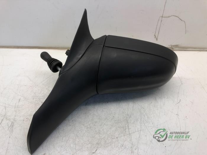 Wing mirror, left from a Opel Corsa B (73/78/79) 1.2i 16V 1998