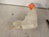 Front windscreen washer reservoir from a BMW 5 serie (E39) 535i 32V 2000