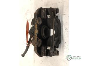 Used Front brake calliper, left Opel Corsa B (73/78/79) 1.2i 16V Price € 35,00 Margin scheme offered by Autobedrijf de Heer B.V.