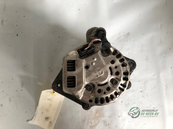 Begagnade Dynamo Daihatsu Cuore (L251/271/276) 1.0 12V DVVT Pris € 35,00 Marginaltabell erbjuds av Autobedrijf de Heer B.V.