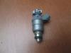 Injector (petrol injection) from a Volkswagen Caddy 2009