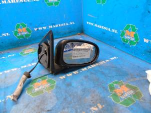 Used Wing mirror, right Nissan Almera Tino Price € 52,50 Margin scheme offered by Maresia Auto Recycling B.V.