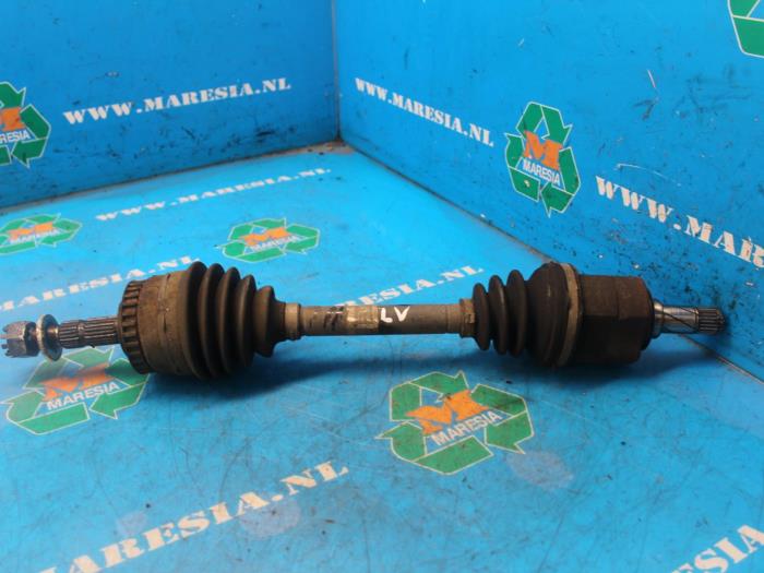 Front drive shaft, left from a Opel Tigra Twin Top  2007